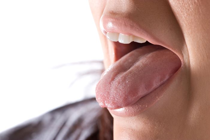 A person sticking out their tongue.